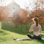 person meditating outdoors