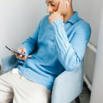 person using bluetooth finder app